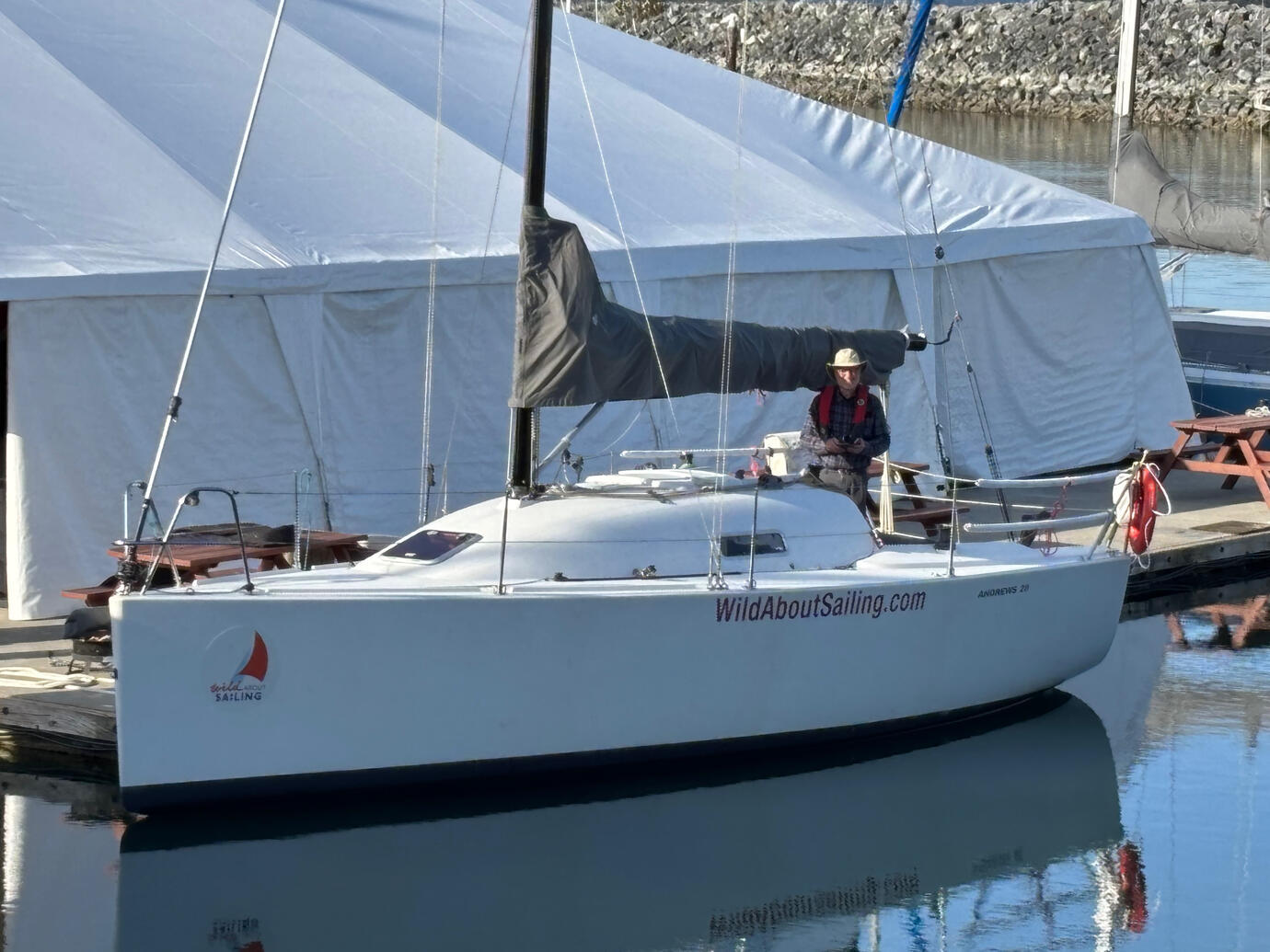 Student Driver at the BC Boat Show. Sailing boat at dawn
